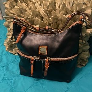 Dooney and Bourke Black with Tan Trim Shoulder Bag.